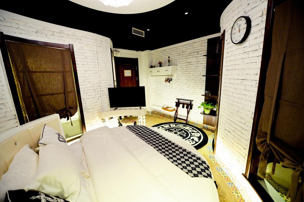 Shenyang Na-Story Loft Hotel Quarto foto